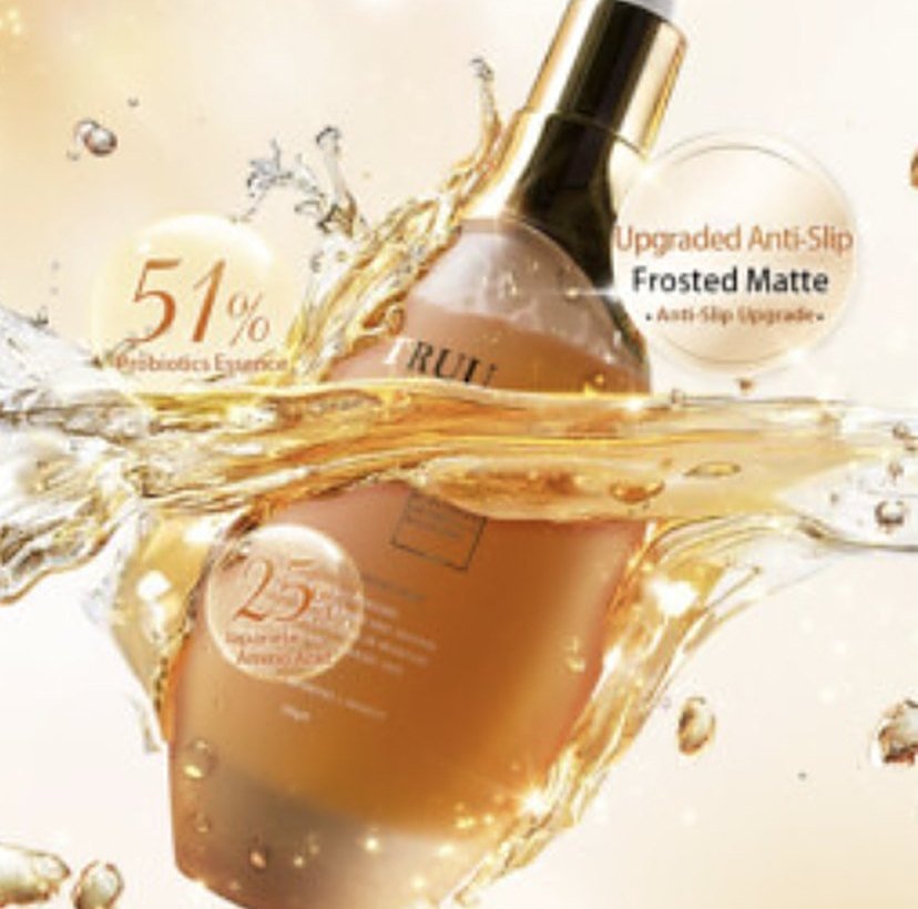 TRUU cleanser bottle in a golden splash of liquid